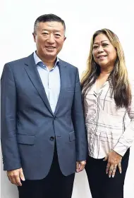  ??  ?? Chinese Ambassador to Jamaica Tian Qi with Bernadette Wong, former vice-president of the Jamaica Exporters’ Associatio­n.