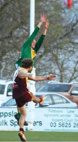  ??  ?? Drouin star Eddie Morris steers through a brilliant 45-metre running goal in the final term to get within striking distance of Leongatha on Saturday but the Hawks couldn’t go on with the job to lose by 21 points.