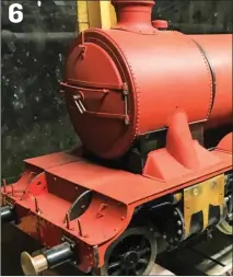  ??  ?? PHOTO 3: Lubricator modified to look more to scale with tank hidden below.
PHOTO 4: Steam pipe cladding also needed work.
PHOTO 5: New outside bracket for expansion links.
PHOTO 6: Lathe work on smokebox produced a more scale appearance. 6