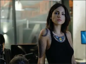  ??  ?? The enhanced and ambiguous KT (Eiza González) has drifting sympathies in newcomer Dave Wilson’s Bloodshot.