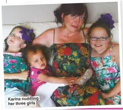  ??  ?? Karina cuddling her three girls