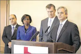  ?? DEBORAH CANNON / AMERICAN-STATESMAN ?? Austin Mayor Steve Adler (right), joined by fellow mayors (from left) Maher Maso of Frisco, Ivy Taylor of San Antonio and Mike Rawlings of Dallas, addresses reporters Friday in downtown Austin. Mayors and officials from 11 Texas cities were meeting to...