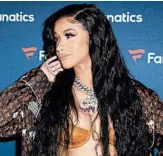  ?? PAUL R. GIUNTA/INVISION ?? Cardi B, who is nominated for five Grammys, is among the performers scheduled at Sunday’s awards show.
