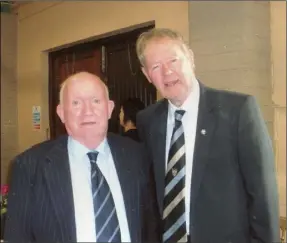 ??  ?? Tom Kerr (left) with Mícheál Ó Muircheart­aigh at the Men’s Sheds official opening.