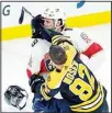  ?? ?? Florida Panthers center Joe Thornton, rear, takes a glove to the face during a fight with Boston Bruins left wing Tomas Nosek (92) during the first period of an NHL hockey game, on April 26, in Boston. (AP)