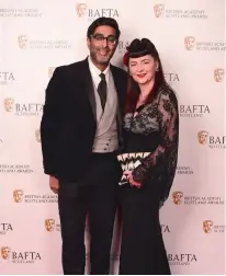  ??  ?? Left: Sanjeev and his wife, Fiona, at the BAFTA Scotland awards