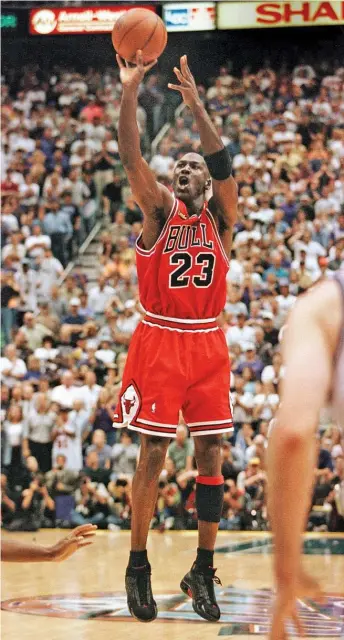  ?? JEFF HAYNES/GETTY IMAGES ?? Michael Jordan became a legend thanks to his heroics in the clutch, and he remains the undisputed late-game scoring assassin of all time.