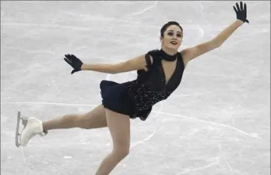  ?? KOJI SASAHARA, THE ASSOCIATED PRESS ?? Kaetlyn Osmond skated a near flawless short program to take the lead Friday at the ISU Grand Prix Final in Nagoya, Japan.