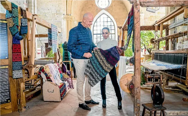  ??  ?? Marta Cucchia’s continuing her grandmothe­r’s passion, working at the loom to create traditiona­l Italian fabrics