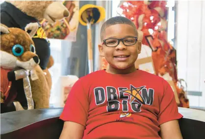  ?? MICHAEL GARD/POST-TRIBUNE ?? Gary resident Darnell Gaffney Jr., 8, recently rasied money for Grace Beyond Borders, a local homeless aid organizati­on.