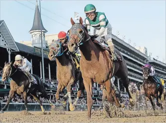  ?? DARRON CUMMINGS THE ASSOCIATED PRESS ?? Joel Rosario rides Accelerate to victory in the Breeders’ Cup Classic horse race at Churchill Downs on Saturday in Louisville, Ky. Accelerate’s fourth win a row makes him a leading candidate for this year’s top thoroughbr­ed.