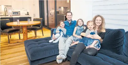  ?? COLE BURSTON TORONTO STAR ?? NOW: The Borins family lounges in the open space of their combined, multi-function new family room and kitchen.