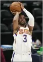  ?? DAVID ZALUBOWSKI — AP ?? Suns guard Chris Paul shoots for a basket in the first half of Game 4of their second-round playoff series against the Nuggets on Sunday in Denver.