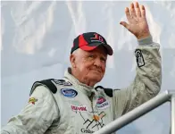  ?? Associated Press ?? ■ In this May 6, 2011, file photo, James Hylton waves to the crowd during driver introducti­ons for the NASCAR Nationwide Series auto race at Darlington Raceway in Darlington, S.C. Former NASCAR driver James Hylton, the 1966 Rookie of the Year, was...