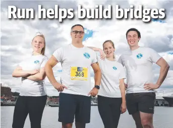  ?? Picture: NIKKI DAVIS-JONES ?? TEAM BONDING: Emily Devenish, Bruno Palermo, Emily Norman and Oliver Hopewell, all of Hobart, are part of the Collins SBA team for Run The Bridge.