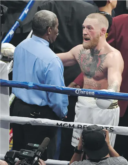  ?? — GETTY IMAGES FILES ?? Conor McGregor may have taken the loss Saturday against Floyd Mayweather Jr., but his career scored a huge victory as he has the leverage now to pursue lucrative fights in UFC or boxing.