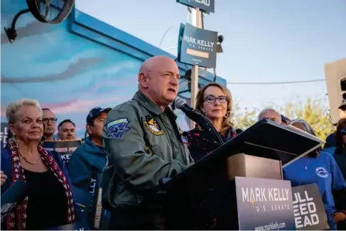  ?? (AP) ?? Mark Kelly in Phoenix, Arizona, yesterday, after his victory in the po ll s