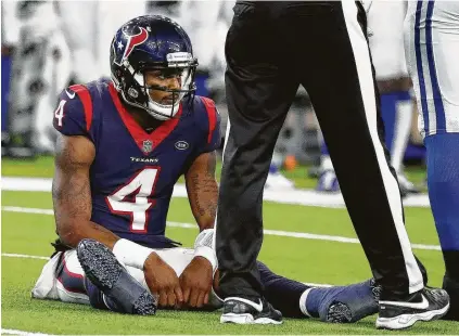  ?? Photos by Karen Warren / Staff photograph­er ?? In his NFL playoff debut, Texans quarterbac­k Deshaun Watson was held to 235 yards passing with one touchdown an one intercepti­on.