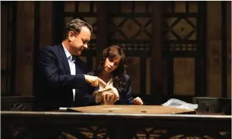  ??  ?? In this file image released by Sony Pictures, Tom Hanks, left, and Felicity Jones appear in a scene from, “Inferno.”— AP