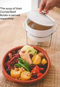  ??  ?? The soup of their Corned Beef Bulalo is served separately