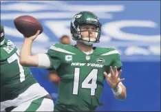  ?? JEFFREY T. BARNES - THE ASSOCIATED PRESS ?? New York Jets quarterbac­k Sam Darnold (14) throws a pass during the first half of an NFL football game against the Buffalo Bills in Orchard Park, N.Y., Sunday, Sept. 13, 2020.