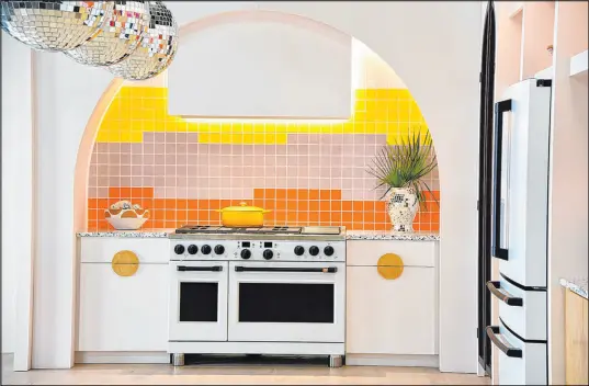  ?? Café ?? The Fearless Energy Pro Range by Café showcased the trends of bright colors used in kitchen design.