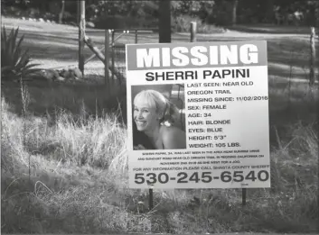  ?? ANDREW SENG/AP ?? In this Nov. 10, 2016, file photo, a “missing” sign for Redding, Calif., resident Sherri Papini is seen near the location where the mother of two is initially believed to have gone missing while jogging.