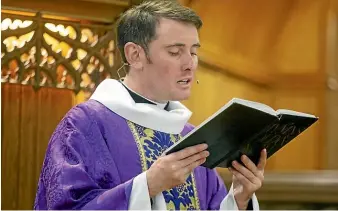  ?? BEJON HASWELL/STUFF ?? Reverend Ben Randall at his first St Mary’s Church mass yesterday.