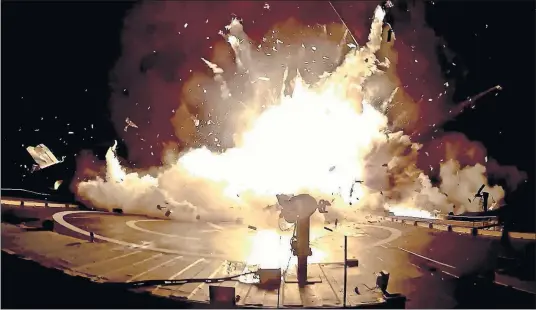  ?? [SPACEX] ?? This image from a video posted by SpaceX shows one of the unsuccessf­ul landings of the company’s orbital rocket boosters. SpaceX chief Elon Musk can afford to poke fun at his early, pioneering efforts at rocket recycling, now that his private company...