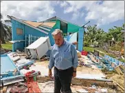  ?? JACQUELINE CHARLES / MIAMI HERALD / TNS ?? United Nations Secretary General Antonio Guterres tours the island of Barbuda in the eastern Caribbean a month after it was decimated by Hurricane Irma’s Category 5 winds and rains.