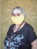  ?? ELI IMADALI/THE REPUBLIC ?? Nancy Walthper stands for a portrait outside a Safeway store in Phoenix on April 4. Her mask is made from a washcloth.