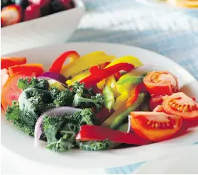  ?? MARK VAN MANEN ?? Albert Kim’s tomato and kale dish.