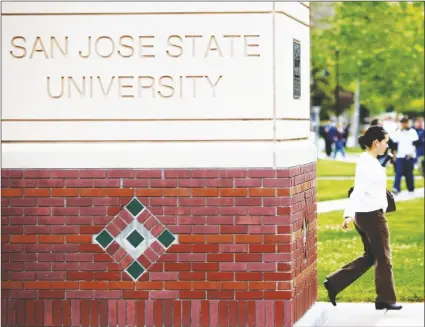  ?? AP PHOTO/PAUL SAKUMA ?? People walk on the campus of San Jose State University in San Jose, Calif., on May 5, 2009.