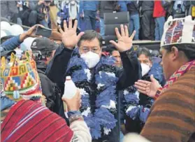  ?? Photo: Aizar Raldes/afp ?? Fruits of their labour: Luis Arce, Bolivia’s newly elected president and ally of former president Evo Morales (below) waves to supporters. His win is seen as victory for democracy.