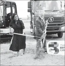  ?? ?? Trade and Industry Minister Paula Gopee-Scoon, left, and Brydens Group deputy chairman, Michael Conyers turn the sod to start the constructi­on of its US$29 million distributi­on centre, on Factory Road, Chaguanas, Friday.