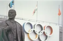  ?? ASSOCIATED PRESS FILE PHOTO ?? Lenin Stadium, the main stadium for the 1980 Moscow Summer Games, and a Lenin statue are shown in July 1980. The United States and 65 other countries boycotted the Moscow Olympics.