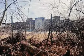  ?? Andrew Brown / CT Mirror ?? The former Cedarcrest Hospital was closed by the state of Connecticu­t in 2010. It is now at the center of an audit into state contracts involving demolition and hazardous material cleanup work.