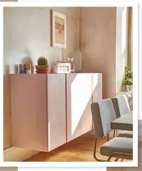  ??  ?? The couple kept the raw pink plaster wall because they loved the colour and mottled e ect which adds subtle interest to this room. Working around this look, they have chosen accessorie­s that work with the pale pink scheme, including terracotta plant pots and a baby pink radio