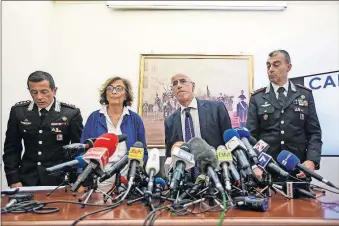  ??  ?? From left, Carabinier­i Colonel Lorenzo D'Aloia, prosecutor­s Nunzia D'Elia, and Michele Pristipino, and Carabinier­i General Francesco Gargaro arrive to a press conference Tuesday about the investigat­ion on the murder of Carabinier­i's officer Mario Cerciello Rega in Rome. [ANDREW MEDICHINI/ THE ASSOCIATED PRESS]