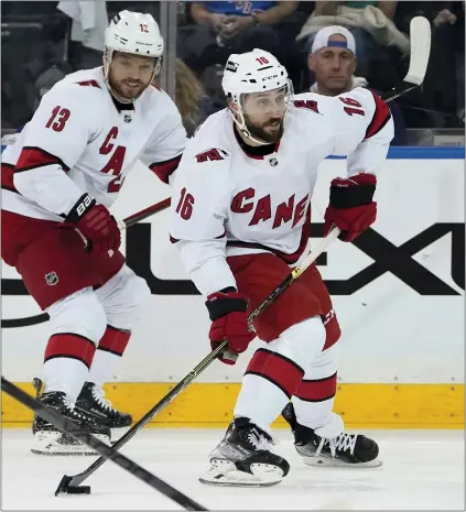  ?? AP FILE ?? Carolina Hurricanes center Vincent Trocheck sets up a shot on goal during the second period of Game 6 of their second-round playoff series against the New York Rangers on Saturday.