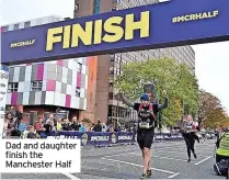  ?? ?? Dad and daughter finish the Manchester Half
