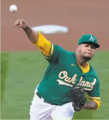  ?? Thearon W. Henderson / Getty Images ?? Frankie Montas worked six shutout innings, perhaps the strongest showing by an A’s starter this year, in the 30 win.