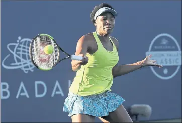  ?? JEFF CHIU – THE ASSOCIATED PRESS ?? Venus Williams hits a return to Maria Sakkari during their quarterfin­al match in the Mubadala Silicon Valley Classic on Friday. Sakkari defeated Williams 6-4, 7-6 and will play Danielle Collins in the semifinals.
