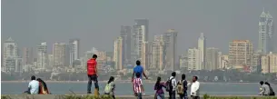  ??  ?? a view of the Mumbai skyline. Real estate is expected to be in the 12 per cent tax rate bracket. —