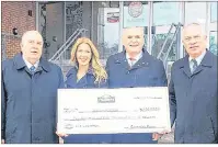  ?? SUBMITTED PHOTO ?? Robert K. Irving, left, president of Cavendish Farms and Wayne McDonald, senior vice president, corporate relations with J.D. Irving, Ltd., right, present a cheque to Brian McMillan, president of Holland College and JoAnn Campbell-Boutilier, executive...