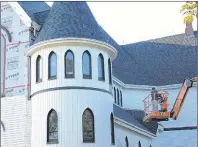  ?? ALYSHA CAMPBELL/JOURNAL PIONEER ?? This summer, the focus of the renovation on St. Malachy’s Church in Kinkora is on installing new siding.