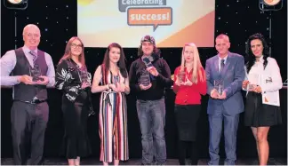  ??  ?? Proud The award winners, from left, Bobby Quinn, Rachael Gray, Emma Gormley, Christophe­r Morris, Amy Orr, Ronnie Lockhart and Lindsay Murray (not pictured: Toni Elliot)