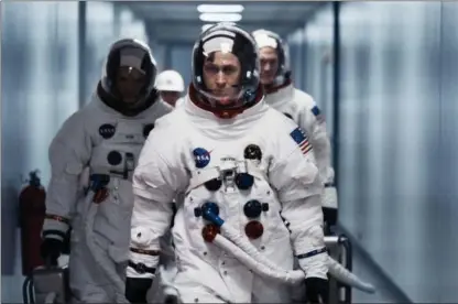  ?? DANIEL MCFADDEN — UNIVERSAL PICTURES VIA AP ?? This image released by Universal Pictures shows Ryan Gosling in a scene from “First Man.”