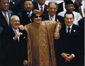  ?? AMR NABIL — THE ASSOCIATED PRESS FILE ?? On Oct. 10, 2010, Libyan leader Moammar Gadhafi, center, with Egyptian President Hosni Mubarak, right, and his Yemeni counterpar­t Ali Abdullah Saleh, left, pose during a group picture with Arab and African leaders during the second Afro-Arab summit in Sirte, Libya.