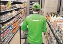  ?? Ted S. Warren The Associated Press ?? Retail grocery services, such as Amazon Go, are changing how people shop by using technology to automatica­lly record and charge a customer’s existing account.